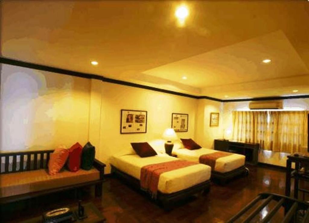 Cucumber Inn Suite Паттайя Номер фото