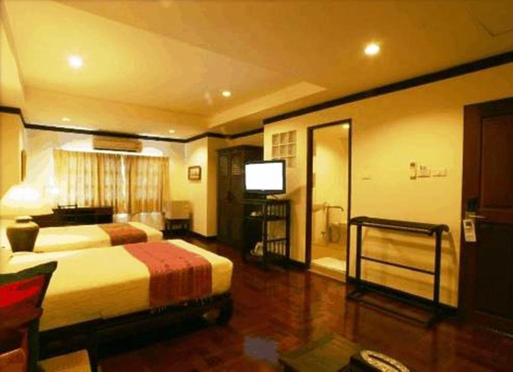 Cucumber Inn Suite Паттайя Номер фото